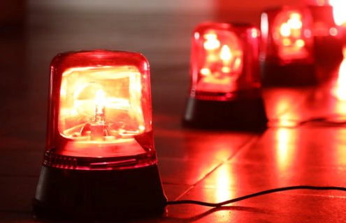 Background with red flashing alarm lights.