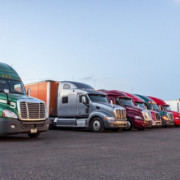 several trucks parked in parking lot_canstockphoto21151162 770x320